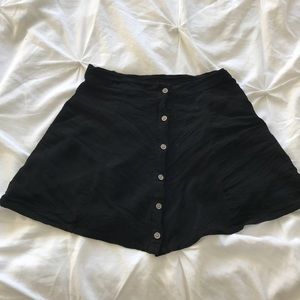 Black high waisted button up mini skirt